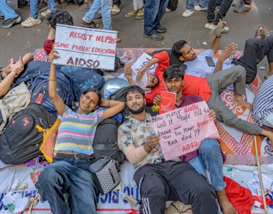 Students holding placards during a peaceful protest in New Delhi, India